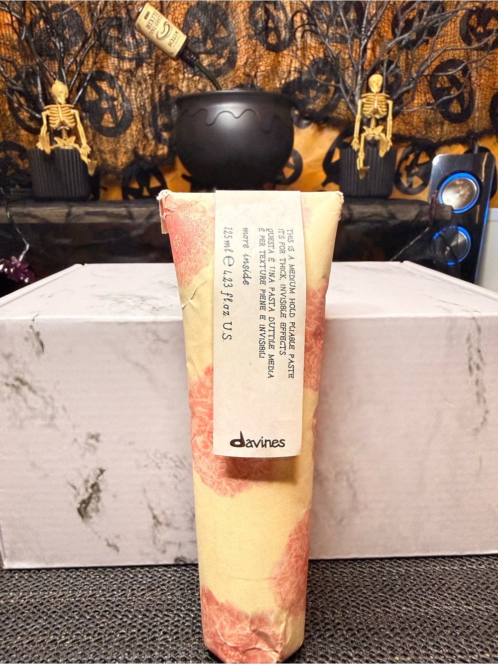 Davines Styling Paste in Tan and Coral Packaging